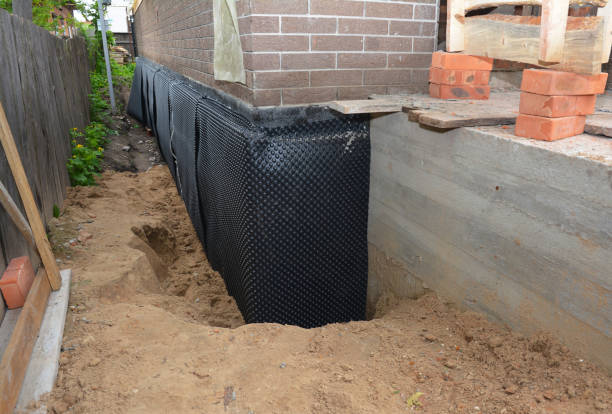 SJ Waterproofing Pros technician performing targeted Foundation Crack Repair assessment in Canton, OH